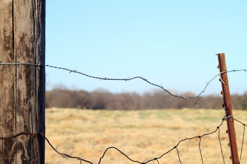 Commercial Barbed Wire Fence Repair