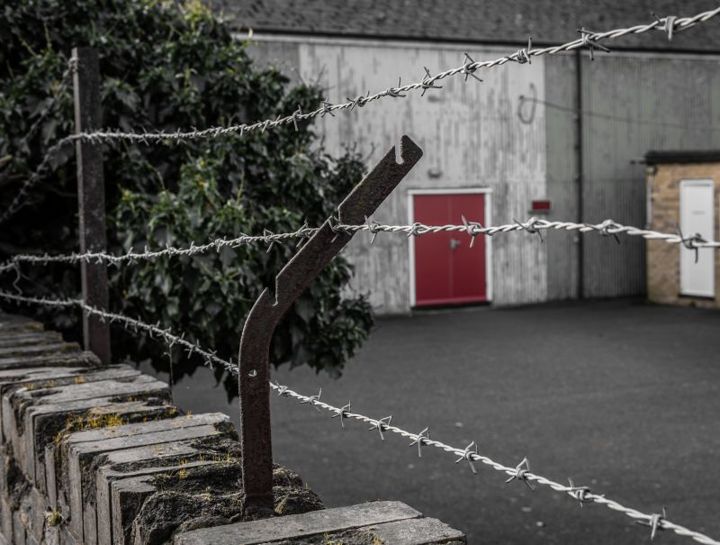 Commercial Barbed Wire Fence Repair
